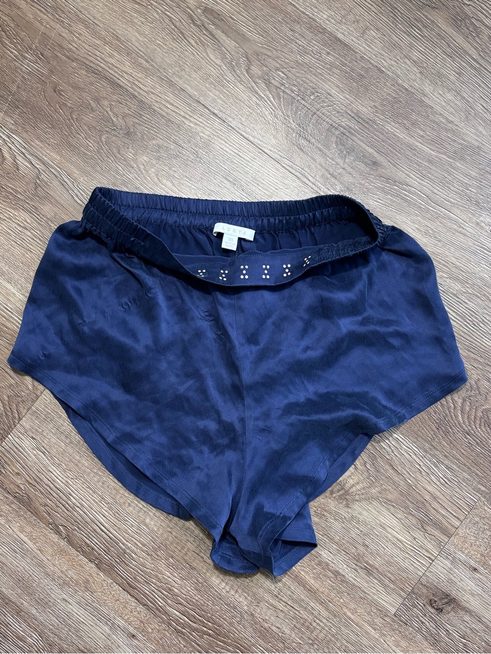 Lunya washable silk shorts featuring a tulip split leg design
